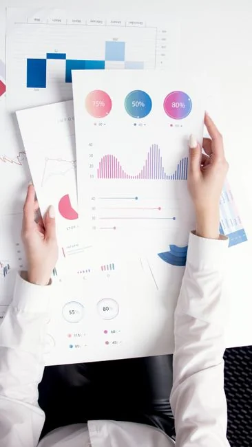 Close-up of various marketing documents on a desk, perfect for business and strategy discussions.
